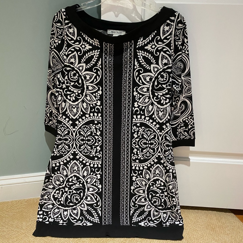 Women’s tunic top. Size medium.